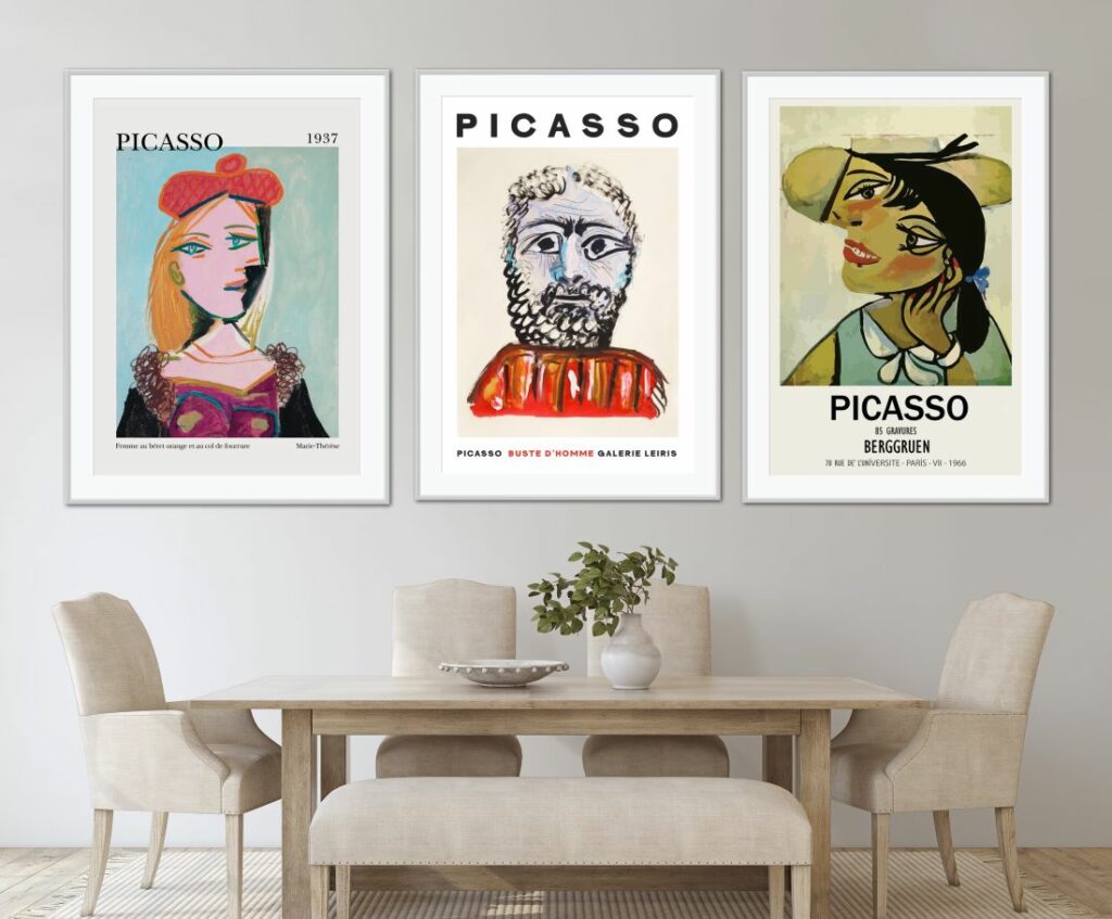 Three framed Picasso prints hanging on a wall in a dinning room