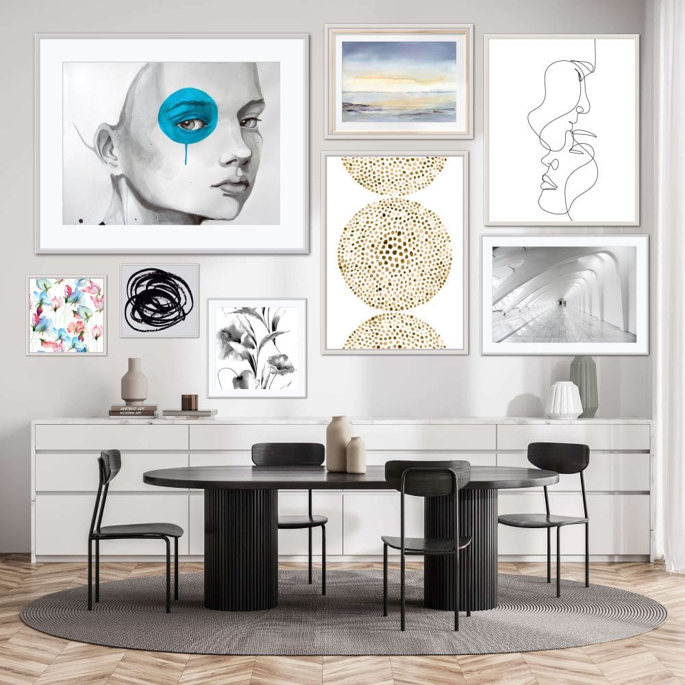 Collage of framed pictures on a wall