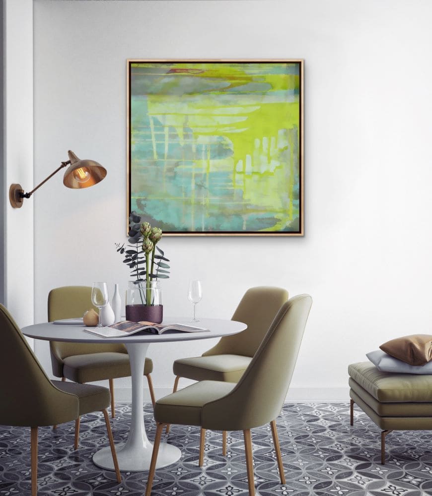 Framed art on a dining room wall