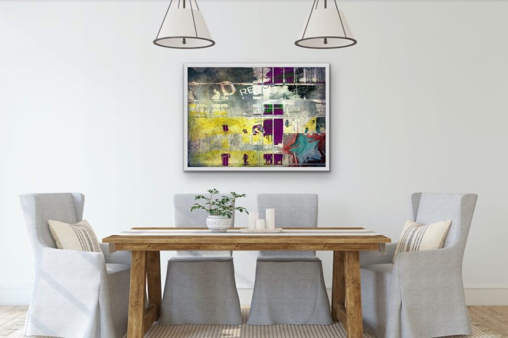 Framed abstract art hanging on wall in dining room