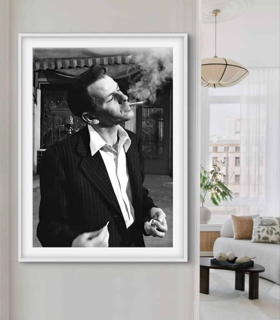 Black and white framed photo of Frank Sinatra lighting a cigarette 