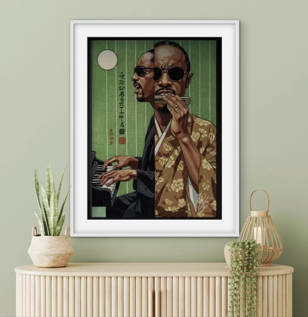 Contemporary interior with a light sage-green wall and a fluted console table, styled with potted plants and a lantern. Displayed above is a framed illustration of a man wearing sunglasses, shown playing a piano and harmonica while dressed in a patterned kimono-inspired robe, blending traditional Japanese artistic influences with a modern portrait style.